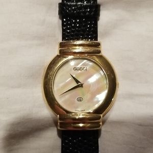 Gucci watch mother of pearl face